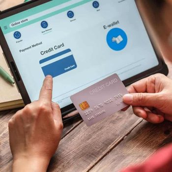 woman-holding-credit-card-online-shopping